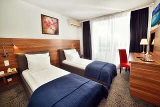 Отель Hotel President Тимишоара Двухместный номер с 2 отдельными кроватями-1